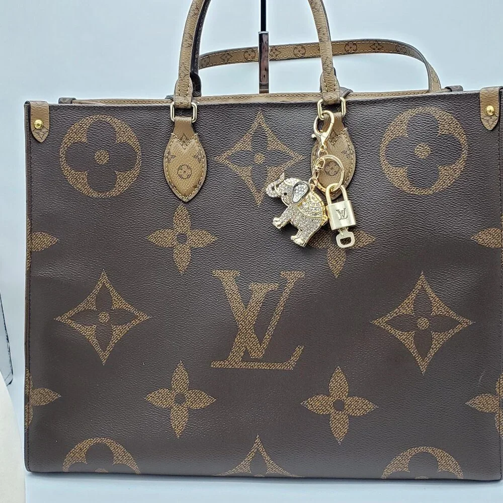 Authentic Louis Vuitton Lock & Key with Unbranded Elephant Charm, Keychain